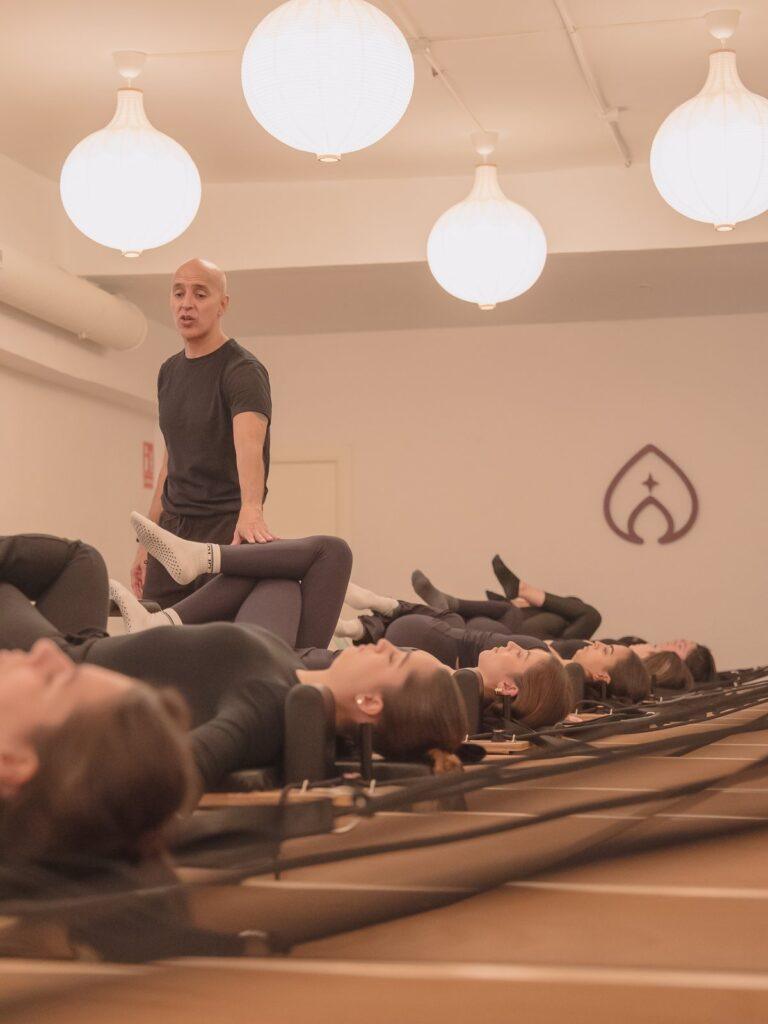 Reformer pilates class with instructor at Pinar Pilates, Madrid